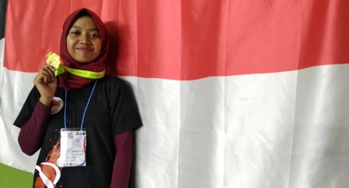 Mahasiswi FEB-UP Meraih Medali Emas Taekwondo Melinda
